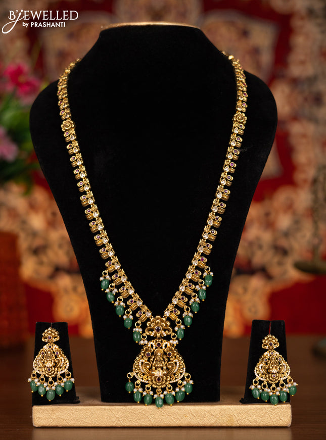 Antique haram lakshmi pendant with kemp & cz stones and pearl & mint green beads hangings