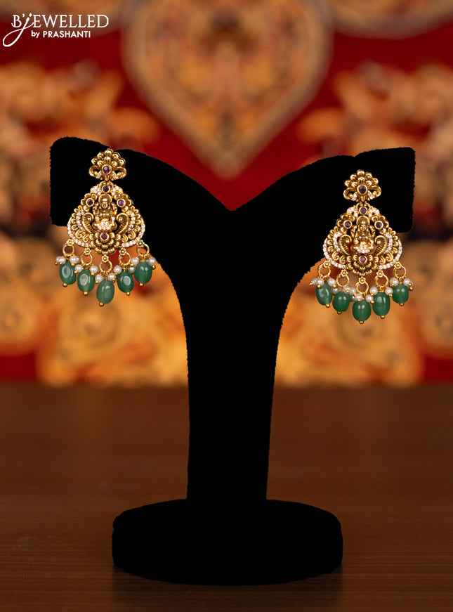 Antique haram lakshmi pendant with kemp & cz stones and pearl & mint green beads hangings