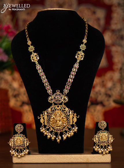 Antique haram lakshmi pendant with kemp & cz stones and pearl & golden beads hangings