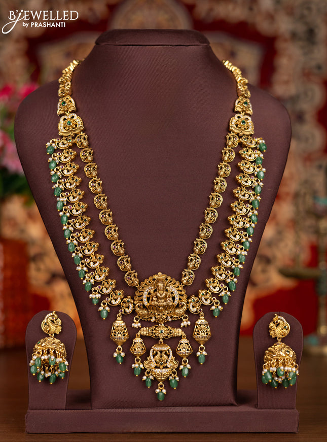 Antique double layer haram lakshmi pendant with kemp & cz stones and pearl & mint green beads hanginngs