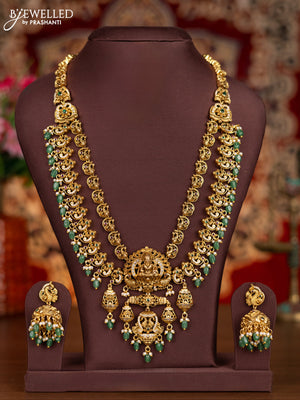 Antique double layer haram lakshmi pendant with kemp & cz stones and pearl & mint green beads hanginngs