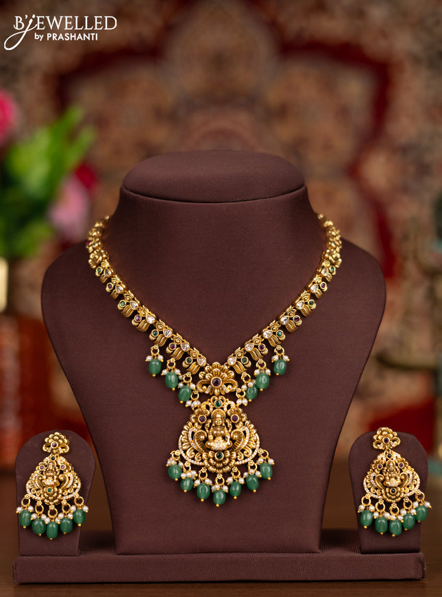 Antique necklace lakshmi pendant with kemp & cz stones and pearl & mint green beads hangings
