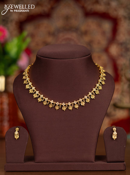 Antique necklace with lakshmi kasu design and kemp & cz stones