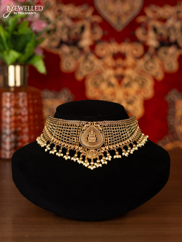 Antique choker lakshmi design with kemp stones and pearl hangings