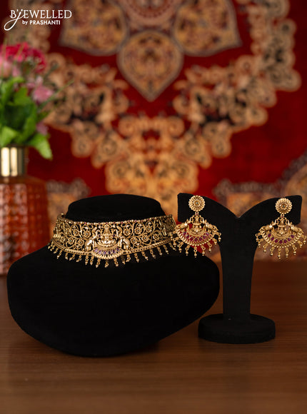 Antique choker lakshmi design with kemp & cz stones and golden beads hangings