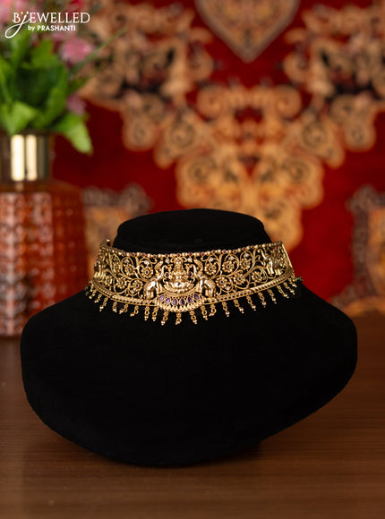 Antique choker lakshmi design with kemp & cz stones and golden beads hangings