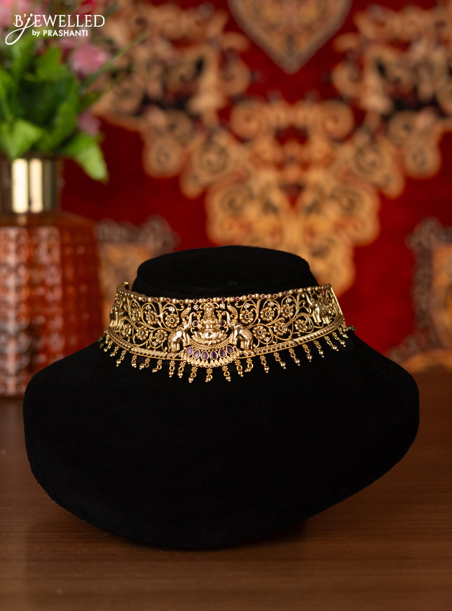 Antique choker lakshmi design with kemp & cz stones and golden beads hangings
