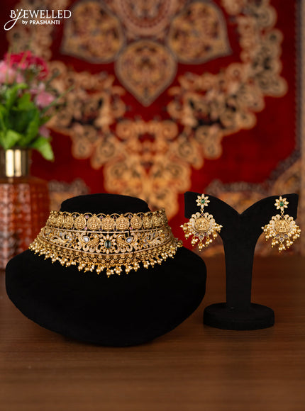 Antique choker lakshmi & peacock design with kemp & cz stones and golden beads hangings