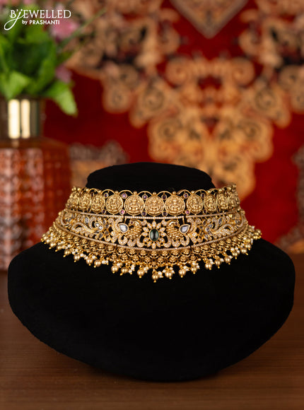 Antique choker lakshmi & peacock design with kemp & cz stones and golden beads hangings