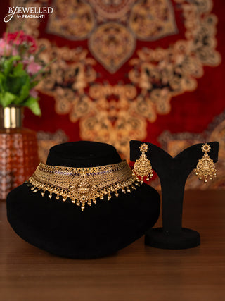 Antique choker lakshmi design with kemp stones and golden beads hangings
