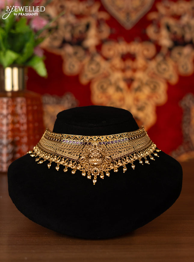 Antique choker lakshmi design with kemp stones and golden beads hangings