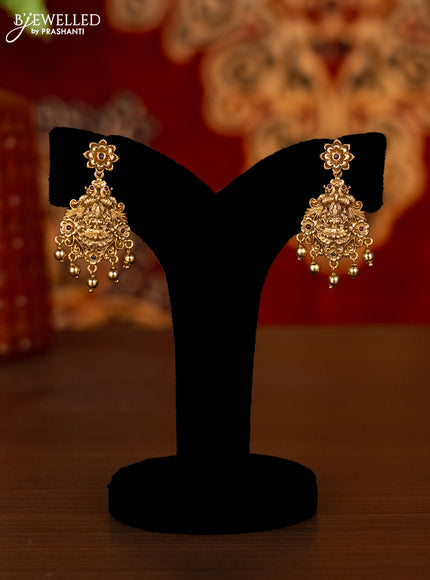 Antique choker lakshmi design with kemp stones and golden beads hangings