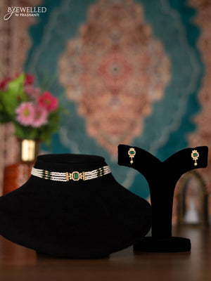 Pearl choker with emerald and cz stones