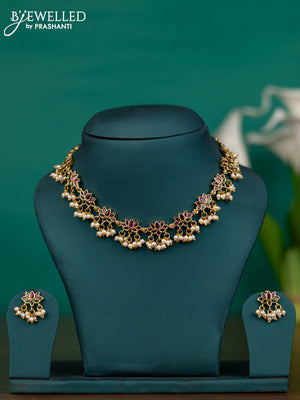 Antique guttapusalu necklace lotus design with kemp stones and pearl hangings