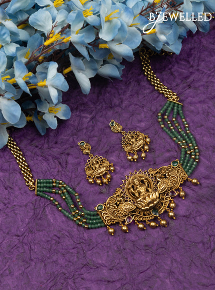 Antique green beaded choker lakshmi design with kemp stones and golden beads hangings