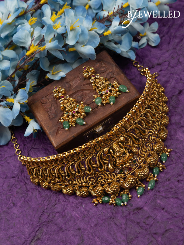 Antique choker lakshmi design with kemp & cz stones and mint green beads hangings