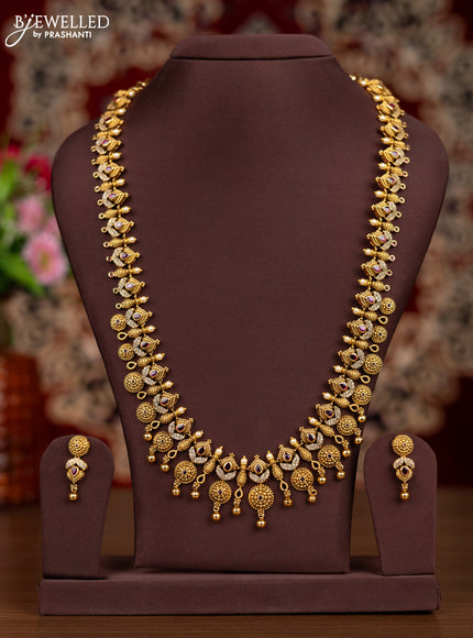 Antique haaram with pink kemp & cz stones and golden beads hangings