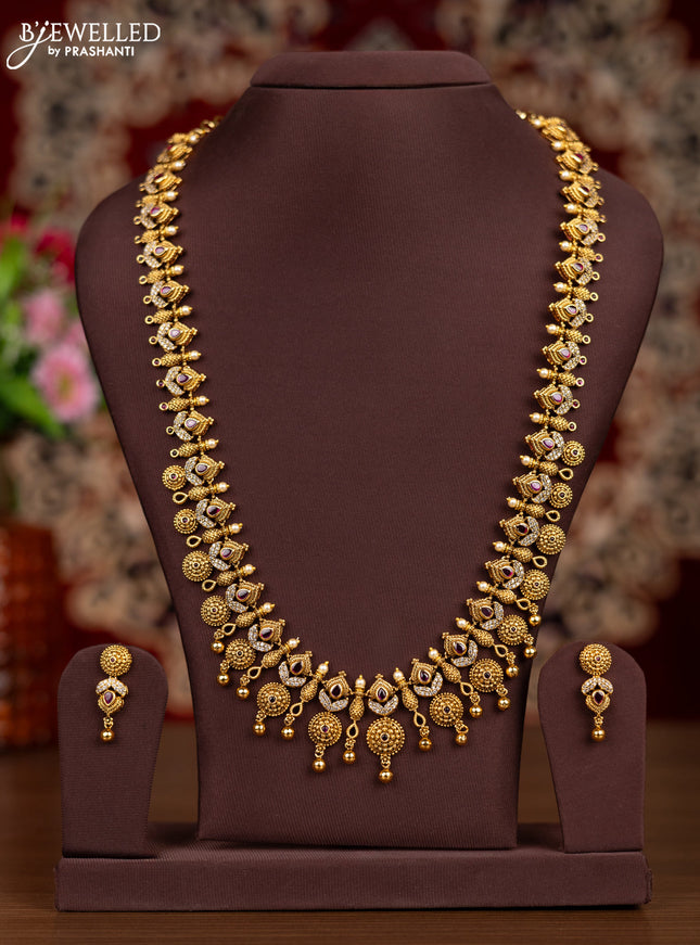 Antique haaram with pink kemp & cz stones and golden beads hangings
