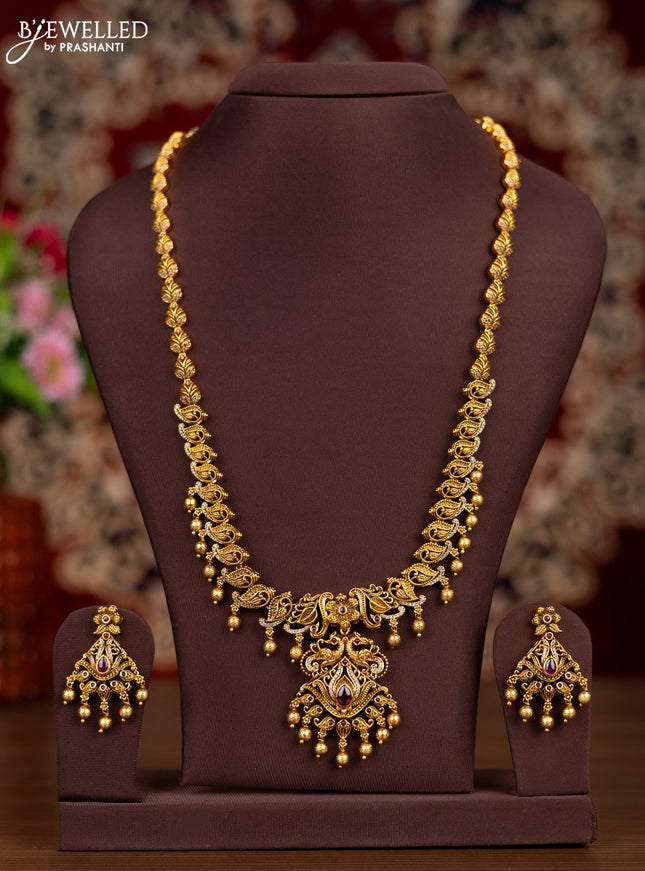 Antique haaram leaf design with pink kemp & cz stones and golden beads hangings