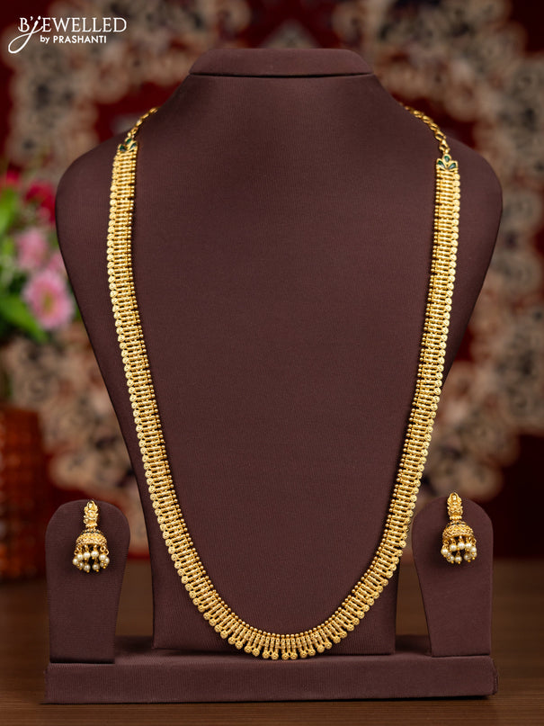Antique haaram with simple design and emerald stones