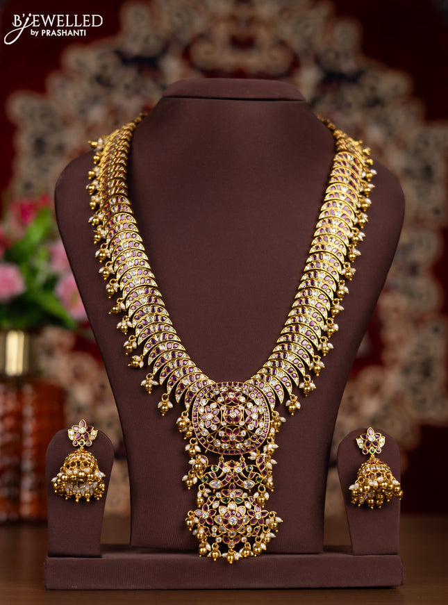 Antique haaram with kemp & kundan stones and pearl & golden beads hangings