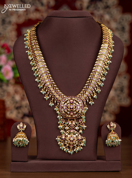 Antique haaram with kemp & kundan stones and pearl & mint green beads hangings