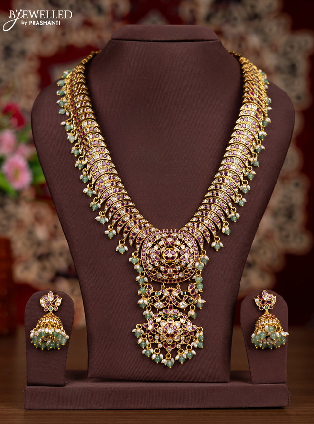 Antique haaram with kemp & kundan stones and pearl & mint green beads hangings