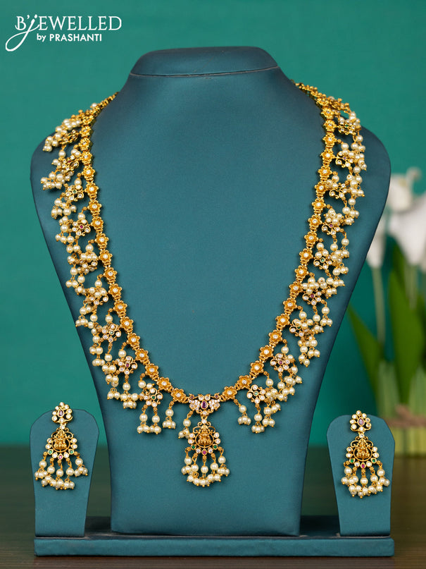 Antique guttapusalu haaram lakshmi & floral design with kemp & cz stones and pearl hangings