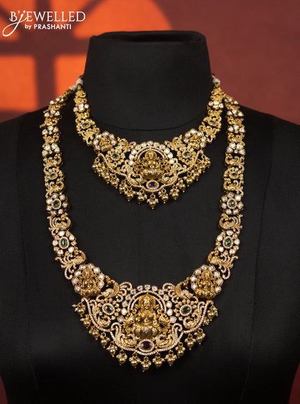 Antique bridal set lakshmi design with kemp & kundan cz stones and pearl & golden beads hangings