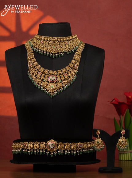 Antique bridal set peacock design with jadau kundan stones and pearl & green beads hangings