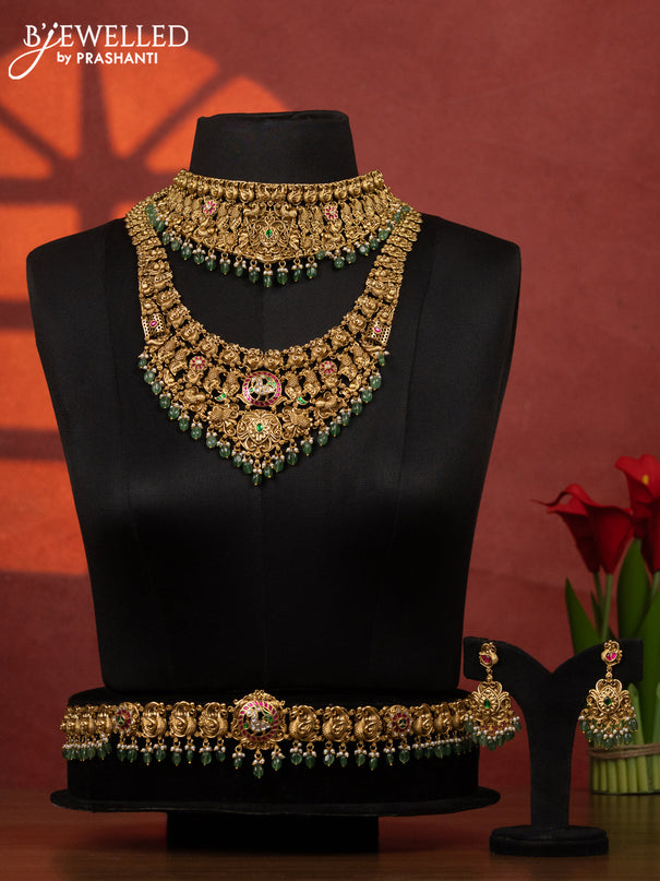 Antique bridal set peacock design with jadau kundan stones and pearl & green beads hangings