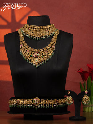 Antique bridal set peacock design with jadau kundan stones and pearl & green beads hangings