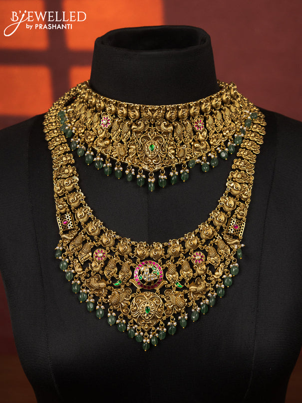 Antique bridal set peacock design with jadau kundan stones and pearl & green beads hangings
