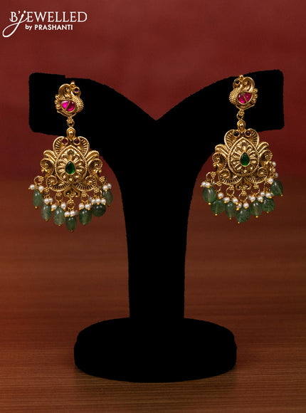 Antique bridal set peacock design with jadau kundan stones and pearl & green beads hangings