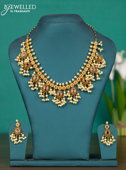 Antique guttapusalu haaram with pink kemp stones and pearl hangings
