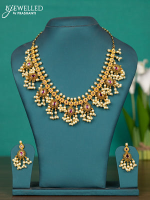 Antique guttapusalu haaram with pink kemp stones and pearl hangings