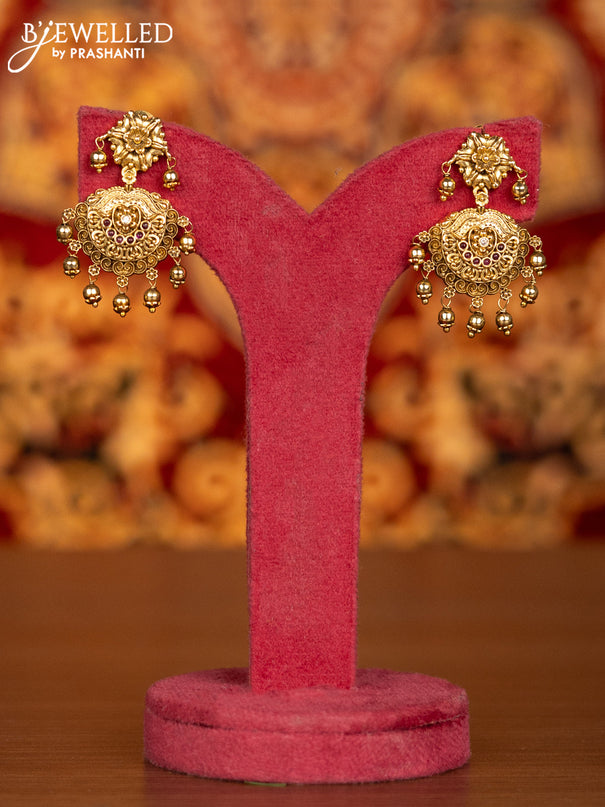 Antique necklace floral design with pink kemp & cz stones and golden beads hangings
