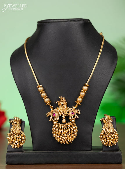 Antique attigai necklace radhai krishna pendant with pink kemp stones and golden beads hangings