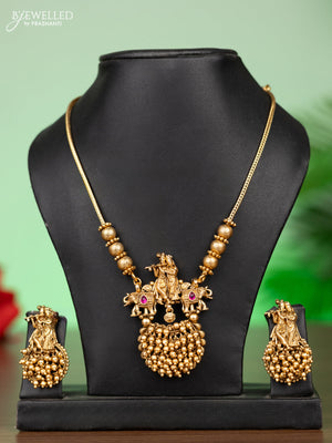 Antique attigai necklace radhai krishna pendant with pink kemp stones and golden beads hangings