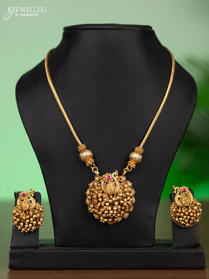Antique attigai necklace peacock design with pink kemp stones and golden beads hangings