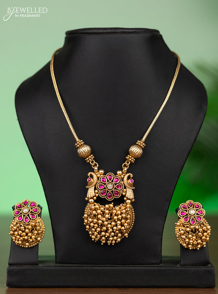 Antique attigai necklace with pink kemp stones and golden beads hangings
