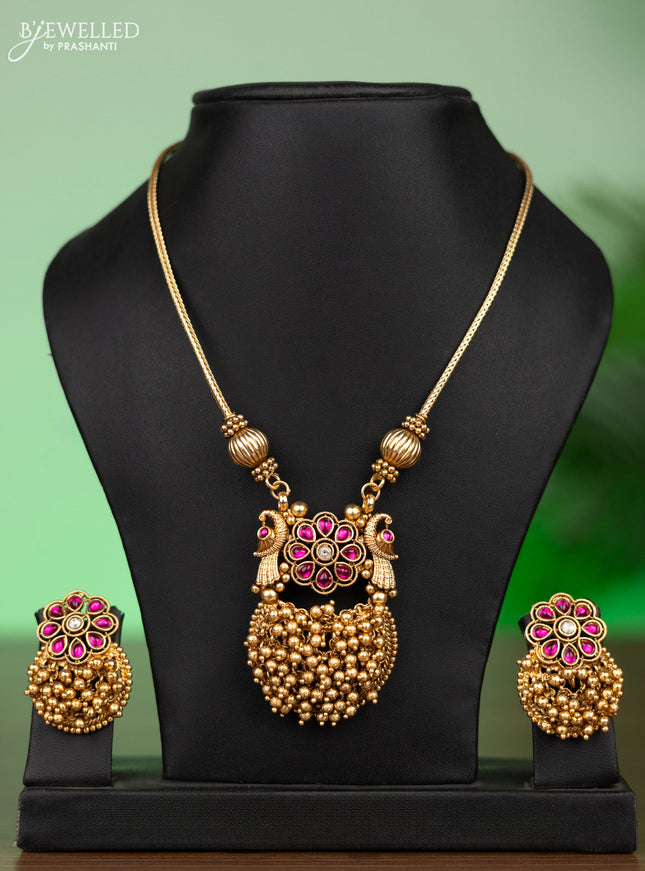 Antique attigai necklace with pink kemp stones and golden beads hangings