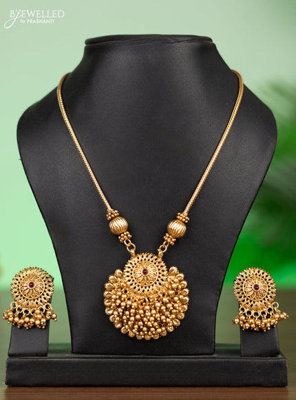Antique attigai necklace with pink kemp stones and golden beads hangings