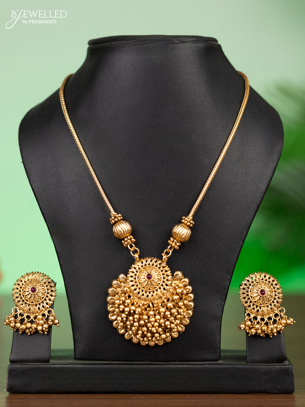 Antique attigai necklace with pink kemp stones and golden beads hangings