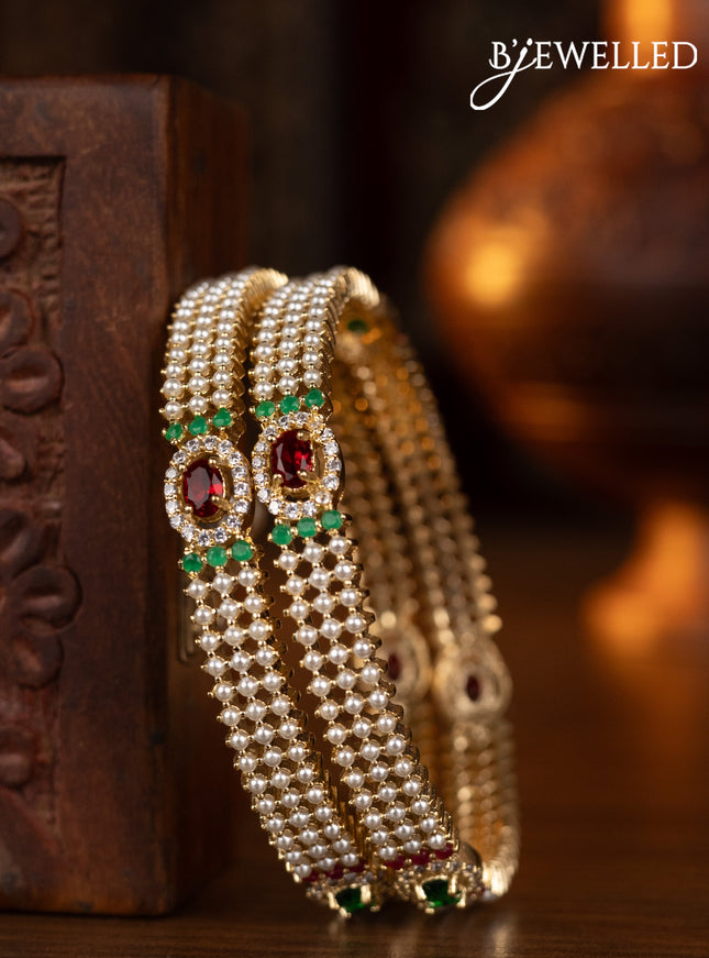Pearl bangles with multicolour & cz stones and pearls in gold finish
