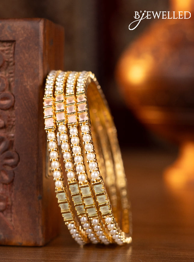 Pearl bangles floral design with mint green & baby pink stones and pearls in gold finish