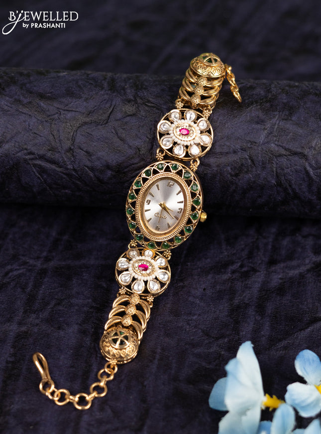 Antique watches with emerald and pink jadau kundan stones
