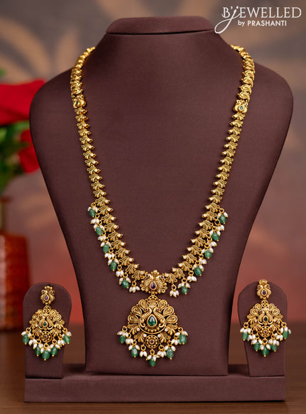 Antique haaram peacock design with kemp stones and pearl & mint green beads hangings