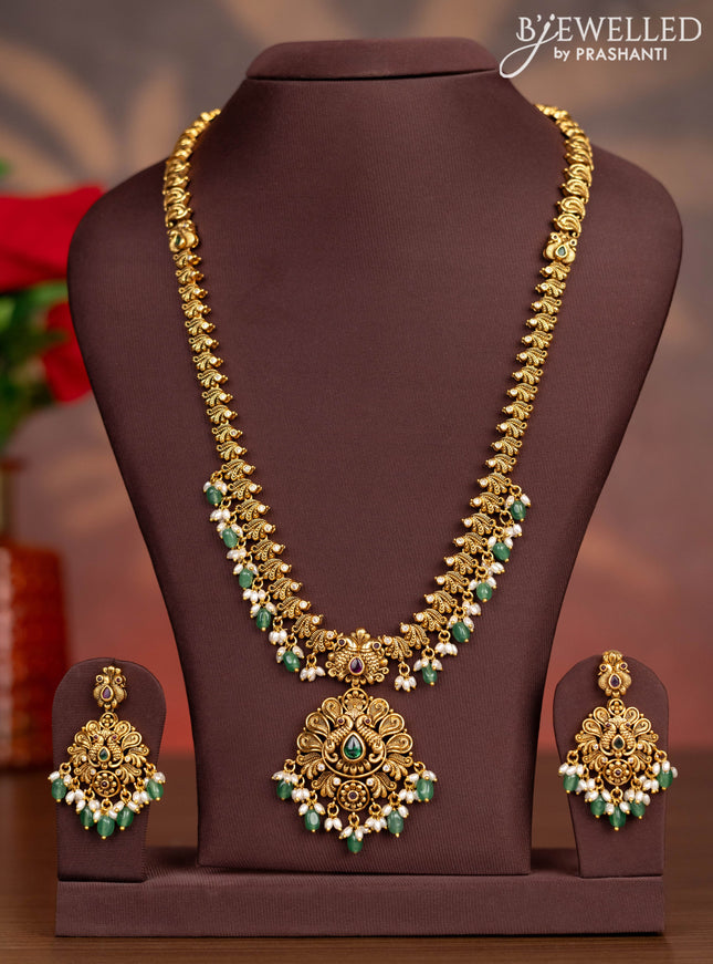 Antique haaram peacock design with kemp stones and pearl & mint green beads hangings