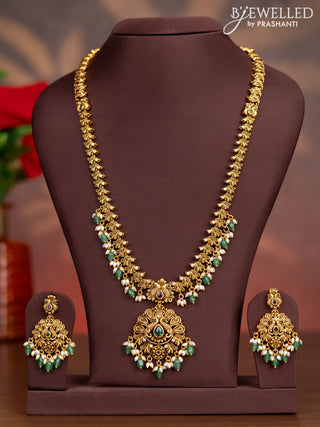 Antique haaram peacock design with kemp stones and pearl & mint green beads hangings